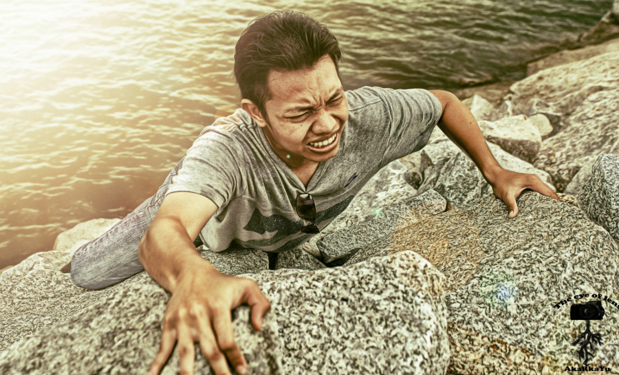 Poem: That Rock by Chad Gramling